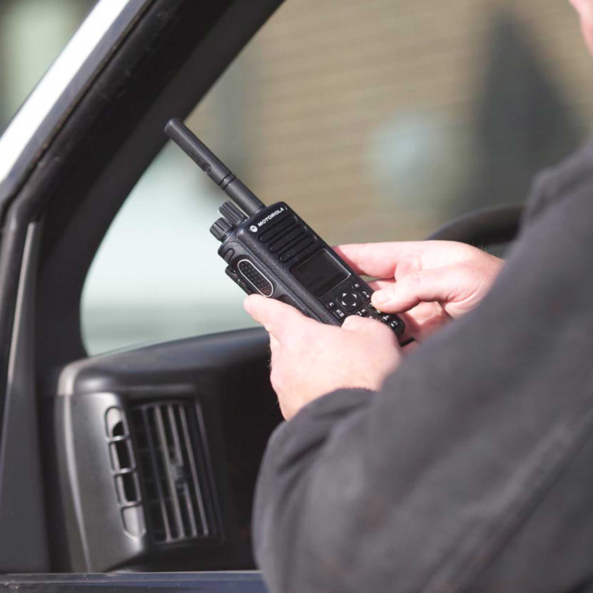 holding-radio-police